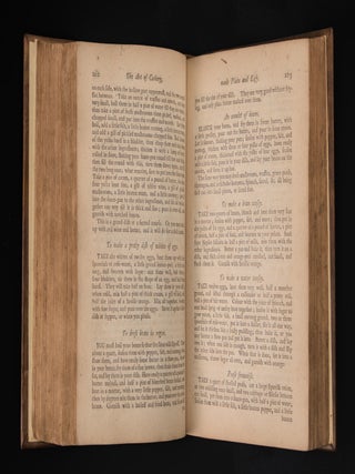 THE ART OF COOKERY MADE PLAIN AND EASY. Which far exceeds any Thing of the Kind yet published.; BY A LADY.