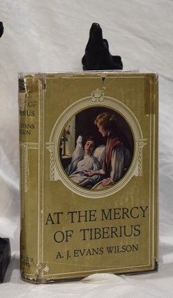 Item #192895 AT THE MERCY OF TIBERIUS. A. J. EVANS WILSON