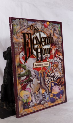 Item #194190 THE ELEVENTH HOUR, A Curious Mystery. Graeme BASE