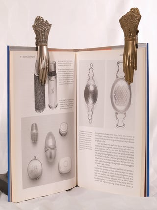 COLLECTING SMALL SILVERWARE.