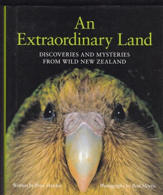 Item #26633 AN EXTRAORDINARY LAND. Discoveries and Mysteries From Wild New Zealand.; Photographs...